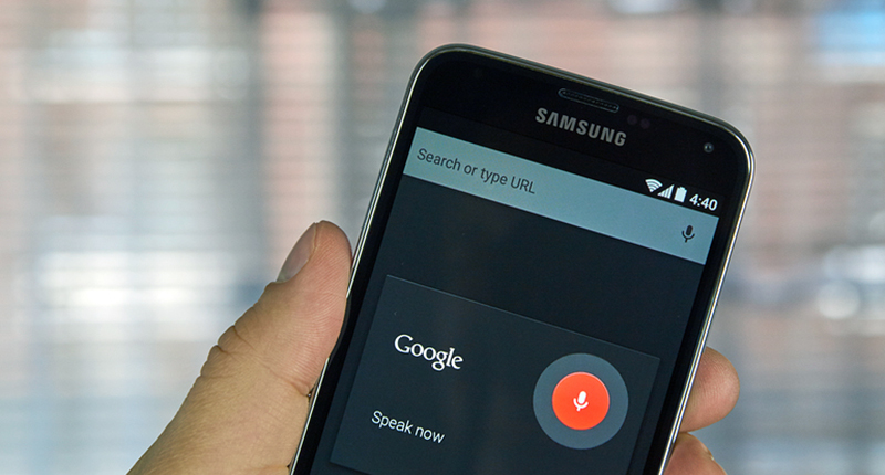 Content creation company photograph of a person using Google voice search query