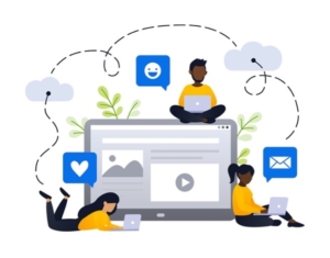 People sitting with computers at a content creation agency
