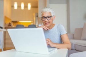 marketing agency older woman on laptop