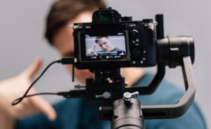 Man vlogging on camera for social media brand awareness
