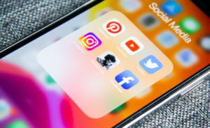 Phone apps in folder related to social media shopping