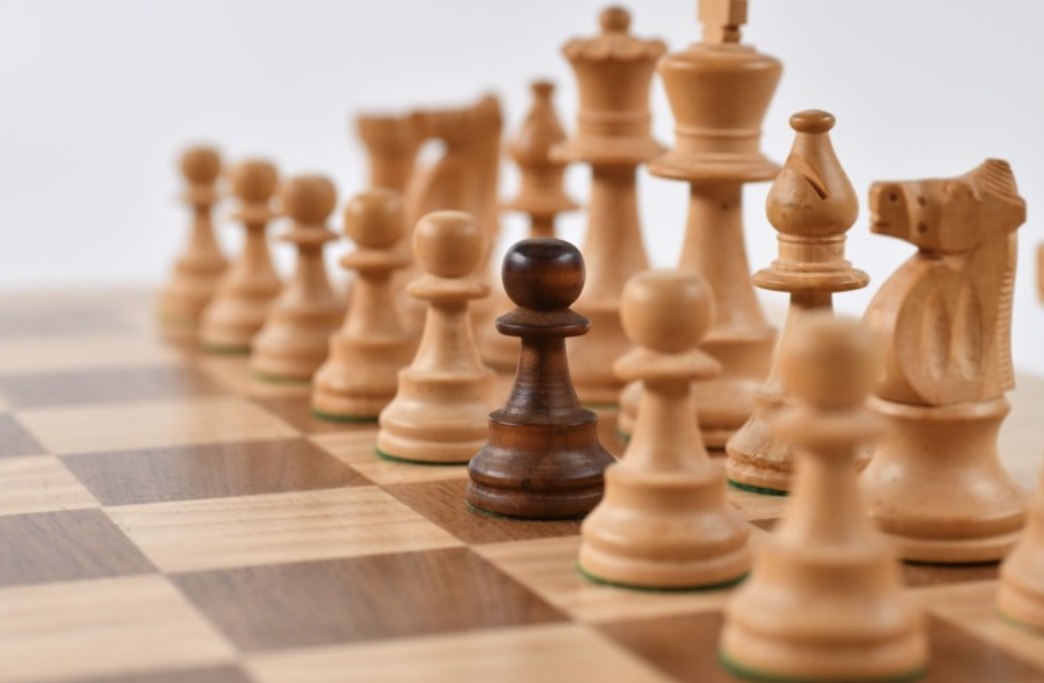 Image for Promoting Competitors Section Social Media Community Management - Chess Board