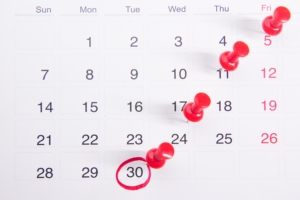 Calendar of a month with days has days marked off on it.
