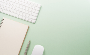 green background white computer keyboard